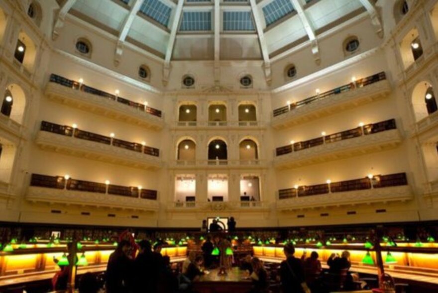 The State Library of Victoria in the evening with dimmed lights. 