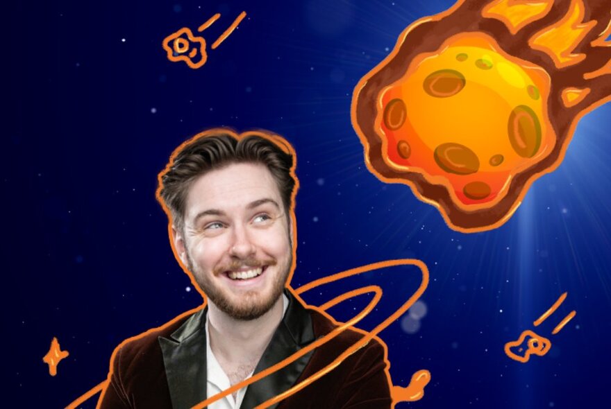 Smiling young man with a beard looking upwards as a drawing of a meteor is hurtling towards him against a dark blue sky.