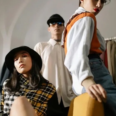 Models wearing coats and shirts.