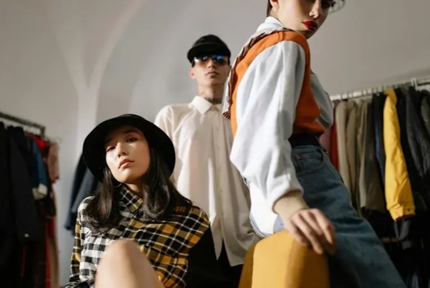 Models wearing coats and shirts.