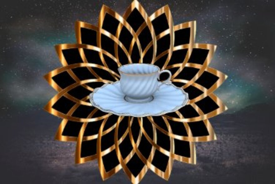 Gilded mandala shape with a cup and saucer floating in the middle of the design.