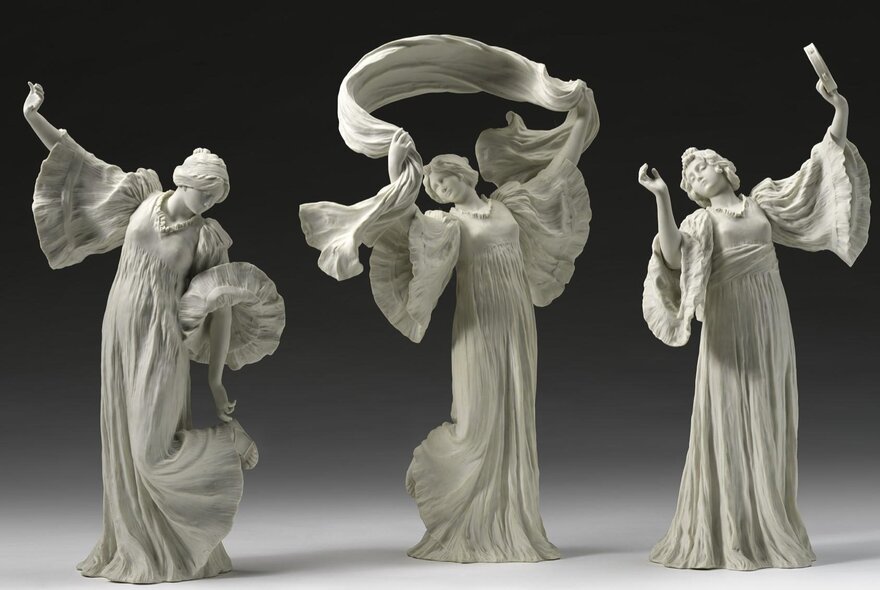 The Scarf Dance (Le Jeu de l’Écharpe) series of porcelain figures by the Sèvres manufactory, showing women dancing in different poses with flowing dresses.