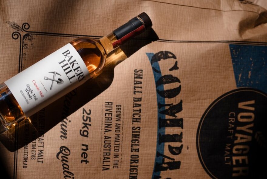 Bottles of whisky and brand-named sacks of ingredients.