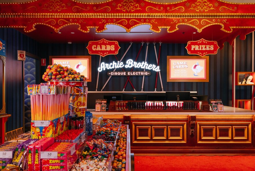 Interior of Archie Brothers games venue, showing a candy counter, and a central bar area.