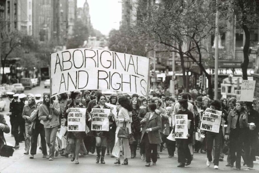 A photo of large group of people protesting for Aboriginal land rights.