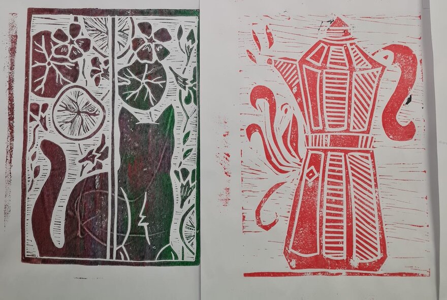 Linocut prints of a red coffee-pot and a black cat sitting at a window, on white paper.