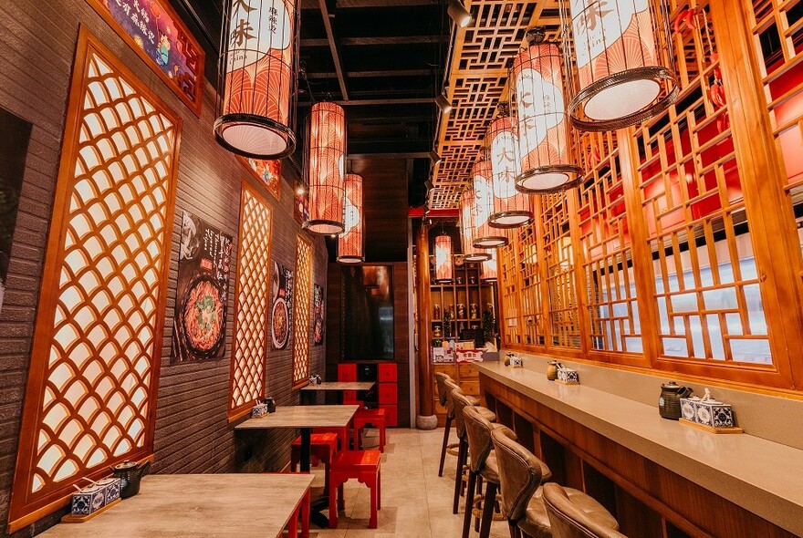 Wooden lattice-work decor of David's Spicy Pot restaurant.