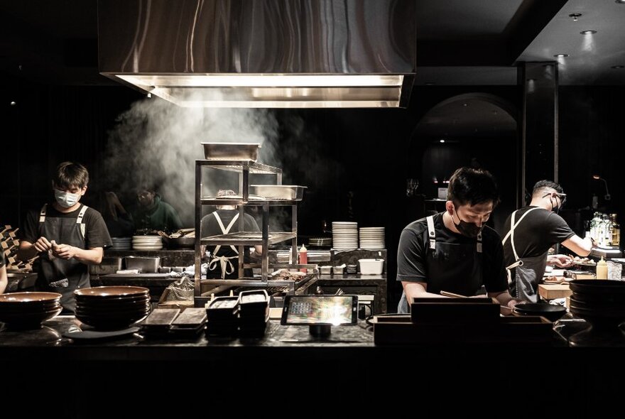 Japanese chefs preparing meals.
