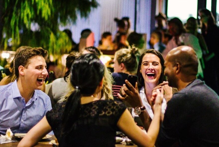 People enjoying a drink together.