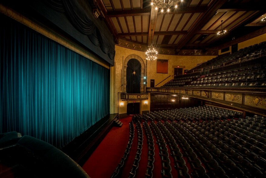 Comedy Theatre stage and tiered seating.