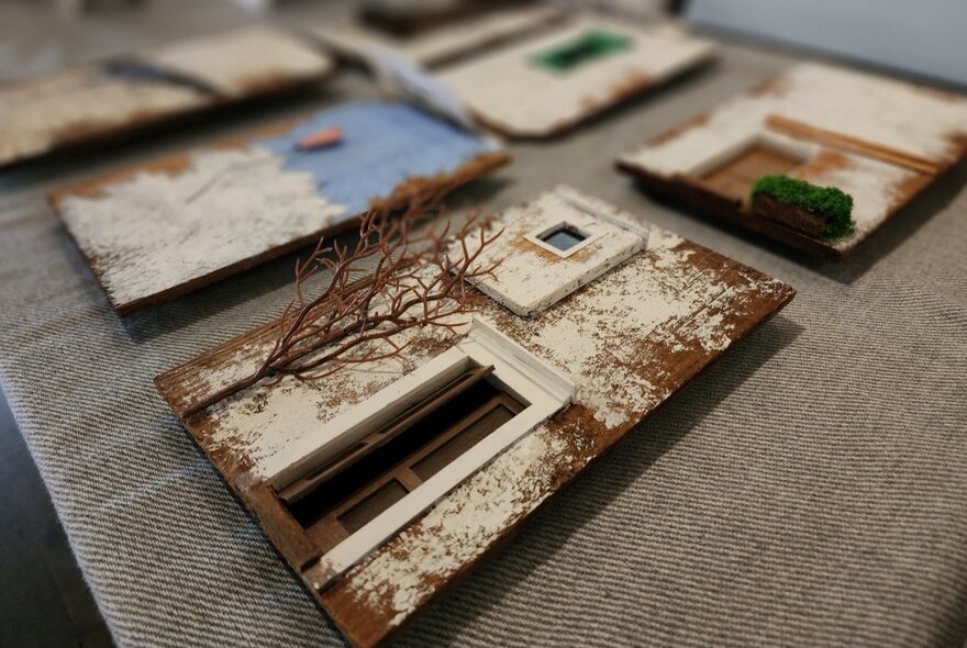 Artwork replicating doorways with windows.