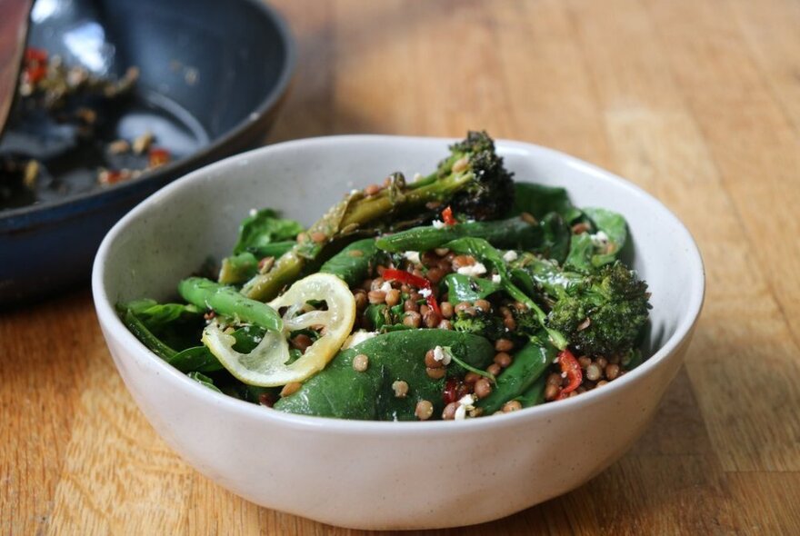 A bowl of mixed veggies including broccolini. 