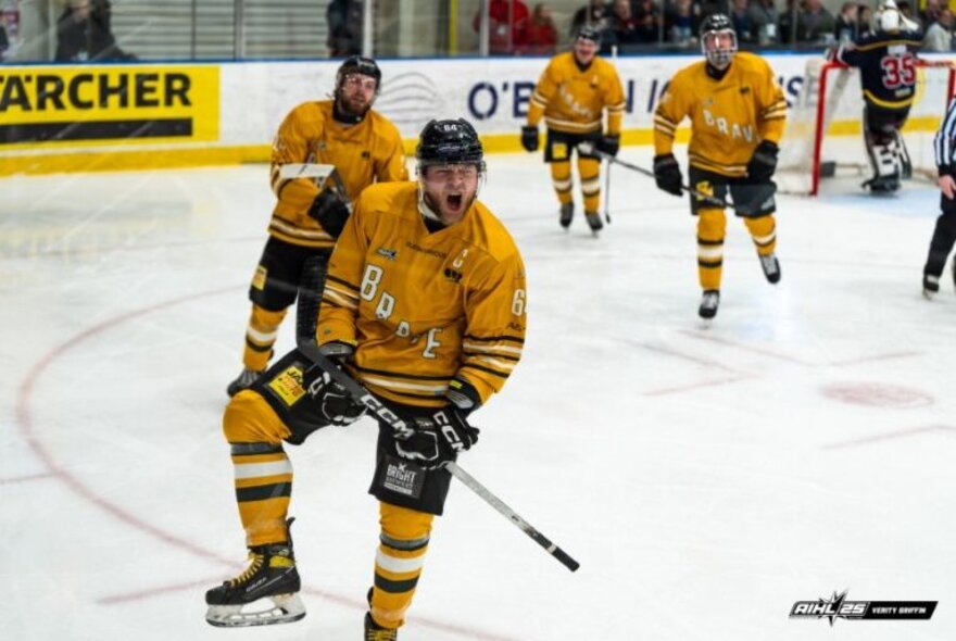Ice hockey players on the ice during a game at O'Brien Icehouse.