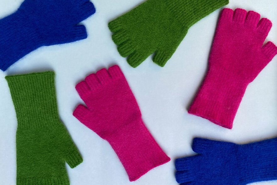 Pink, green and blue fingerless gloves