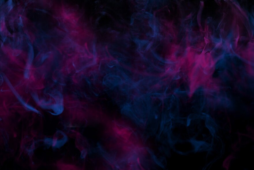 A dark obscure image with flashes of deep purple and blue.
