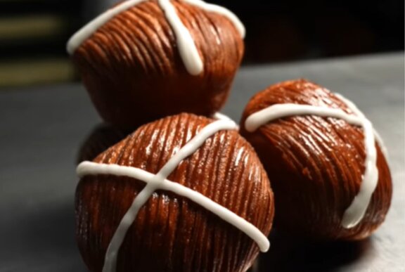 Three hot cross bun inspired pastries.