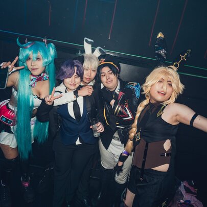 People at an anime rave in cosplay. 