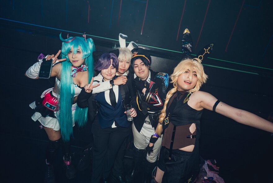 People at an anime rave in cosplay. 