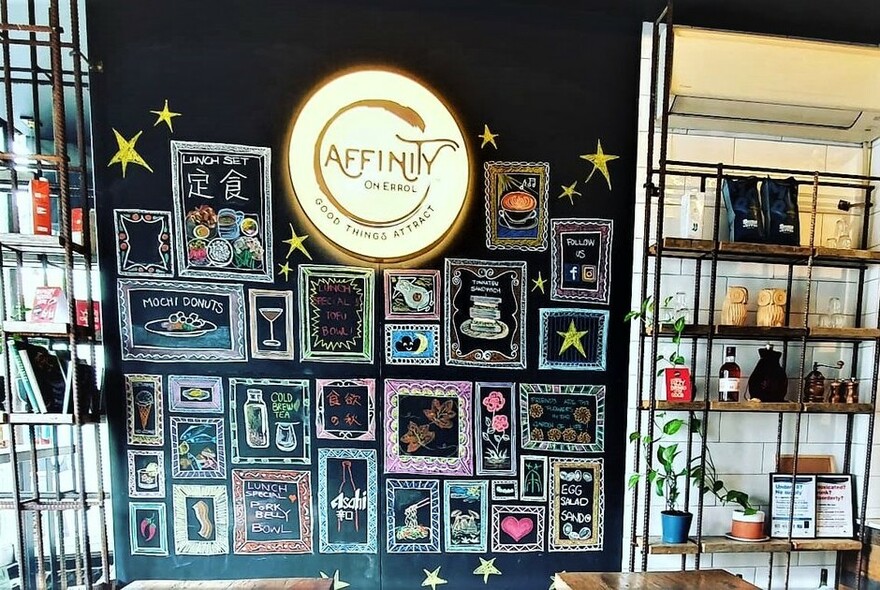 Colourful chalkboard wall under Affinity signage.