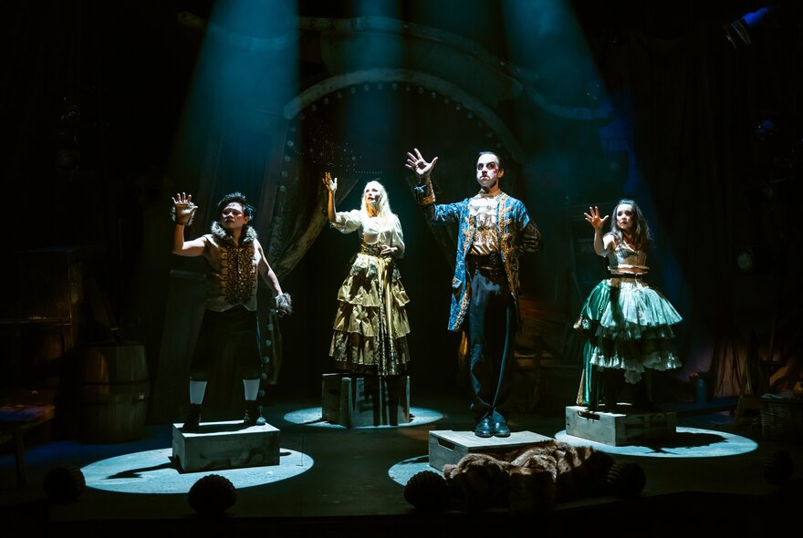Figures performing on stage on pedestals under spotlights, wearing period costume.