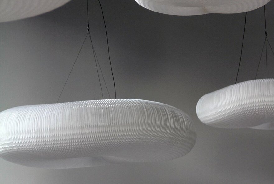 Light shades hanging from ceiling.