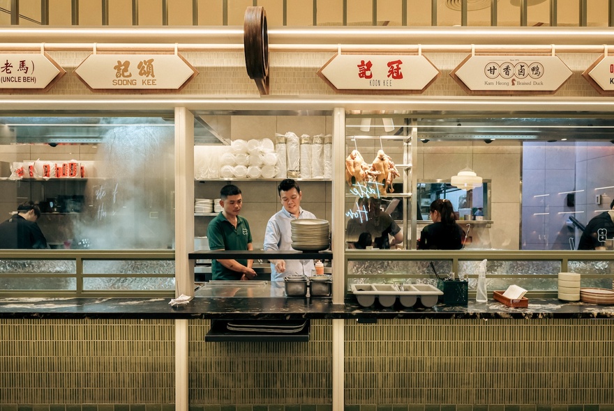 A view into the open kitchens at QV's Eat Alley Malaysian eatery.