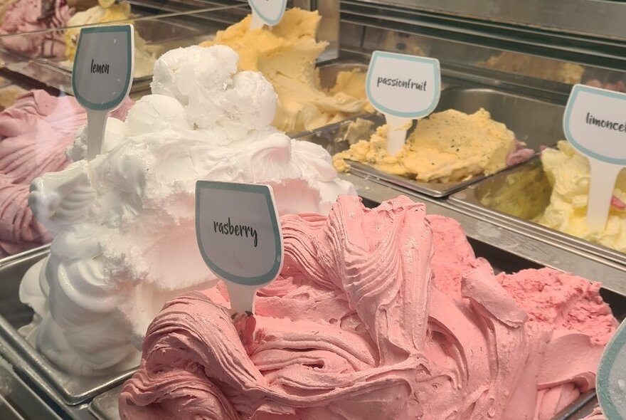 Tubs of different-flavoured gelati.