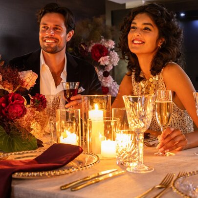 A romantic dining moment between a couple at the Alluvial Restaurant.