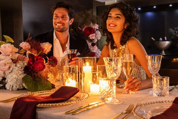 A romantic dining moment between a couple at the Alluvial Restaurant.
