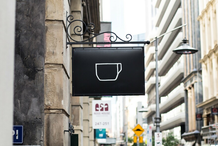 Coffee cup sign in Flinders Lane.