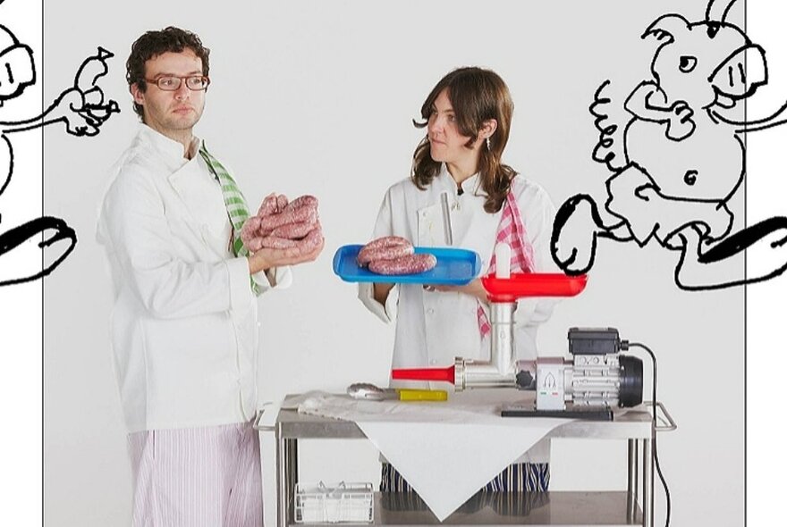 Two chefs holding sausages behind a table with a sausage-maker, with overlaid hand drawn cartoon creatures.