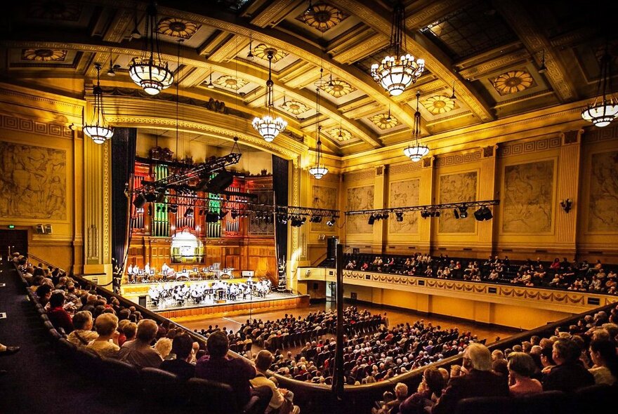 An concert inside a large historic hall