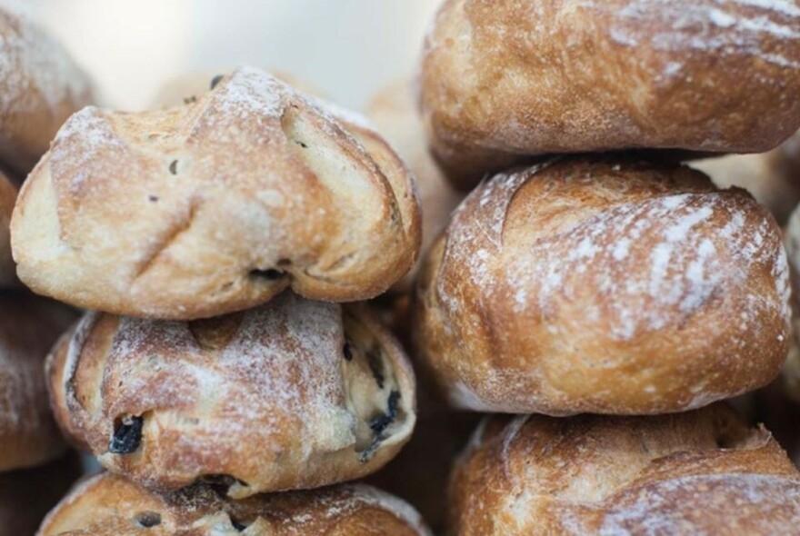 Bread rolls containing dried fruit.