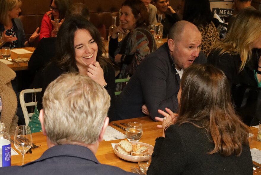 Patrons enjoying a meal at a dining establishment.