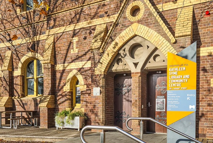 Historic old brick building of Kathleen Syme Library and Community Centre.