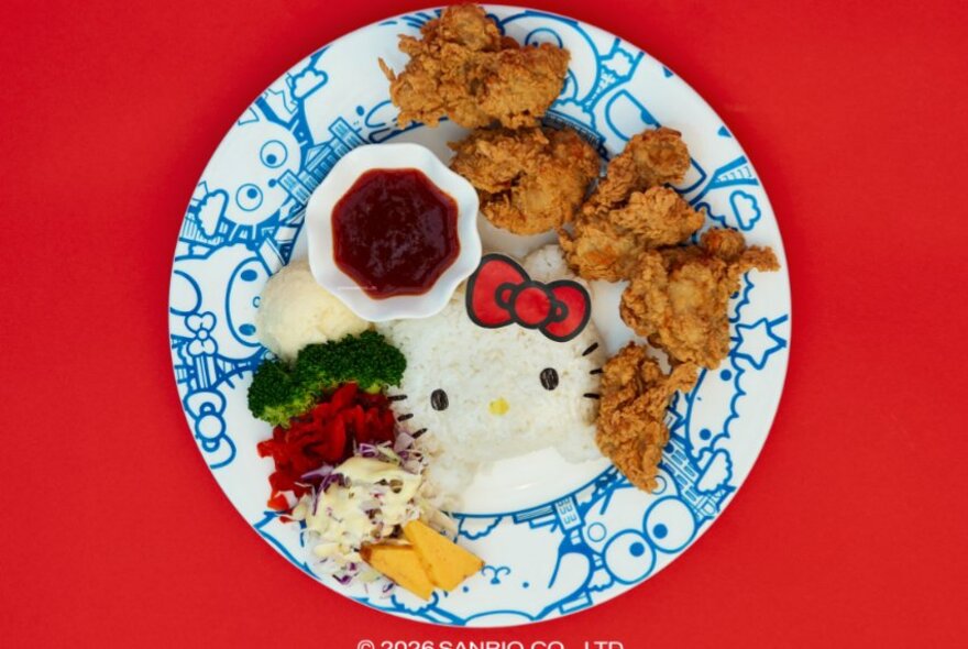 Looking down at a plate of food from the Hello Kitty themed cafe.