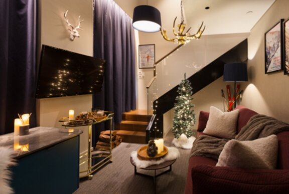 A cosy winter themed hotel room.