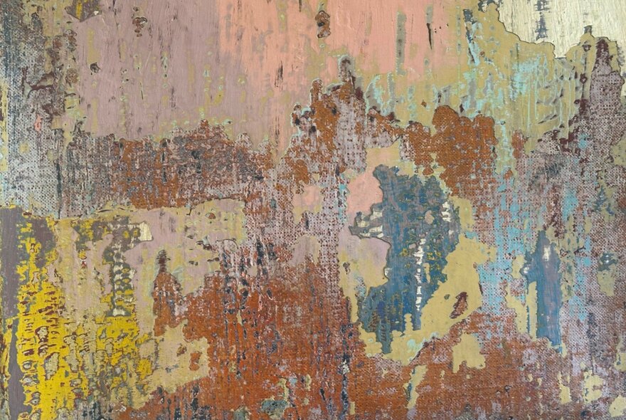 An abstract oil painting with patches of brown, yellow and peach colours on linen.