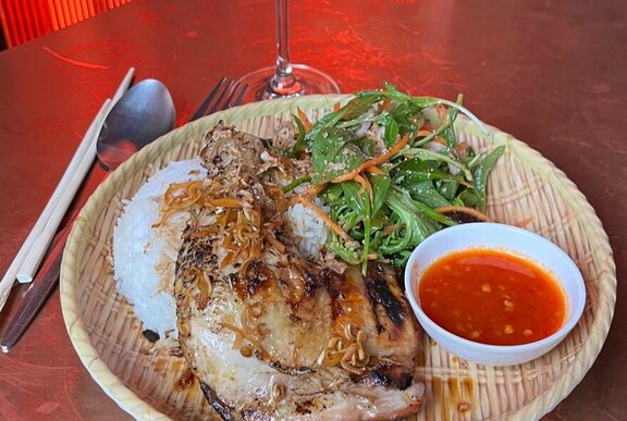 Plate of chicken with chilli sauce.
