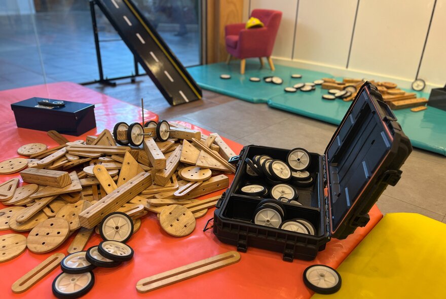 A toolbox with play construction tools.