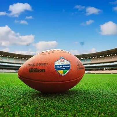 NFL ball on the turf at the MCG.