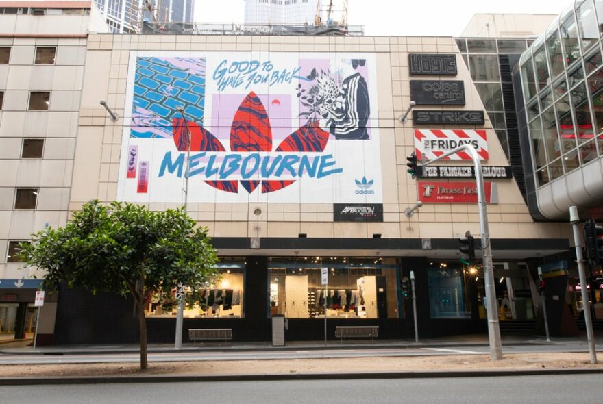 A large Adidas advertisement on the exterior wall of Melbourne Central 