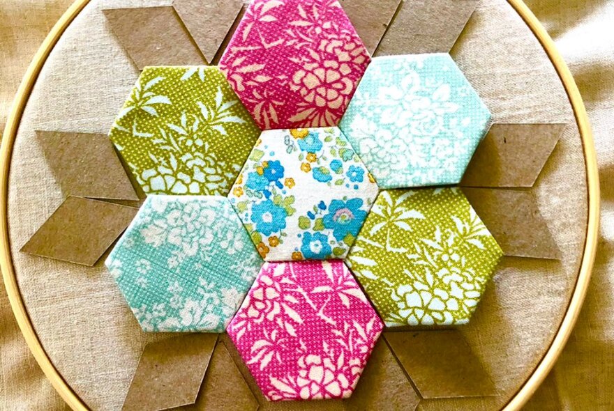 Fabric patchwork segments forming a hexagonal pattern.