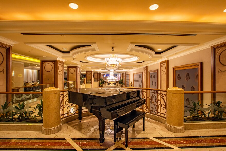 A grand piano located in The Langham Hotel, Melbourne, overlooking the lobby.