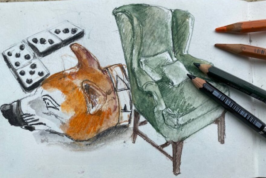 A pencil sketch of a green armchair with the coloured pencils resting on the white paper.