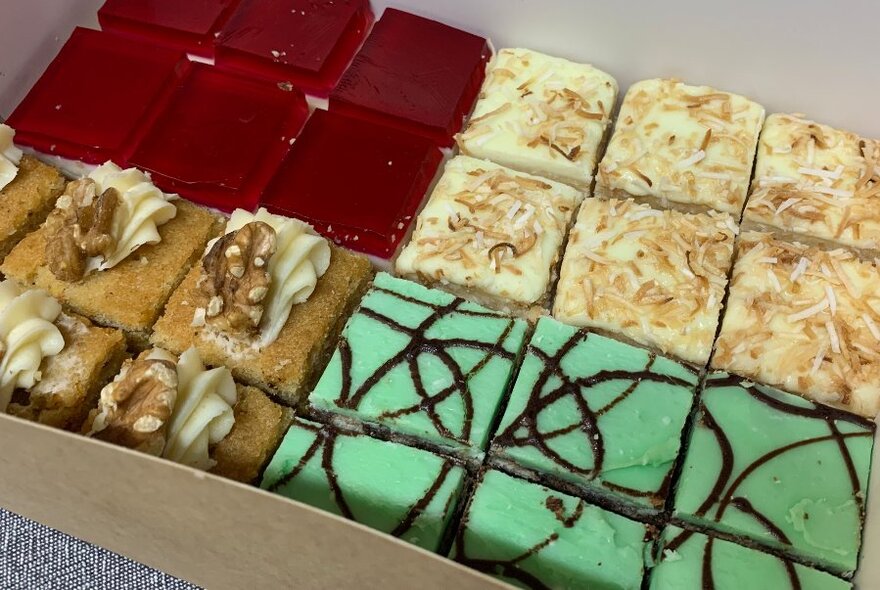 Cardboard tray of four different slices.