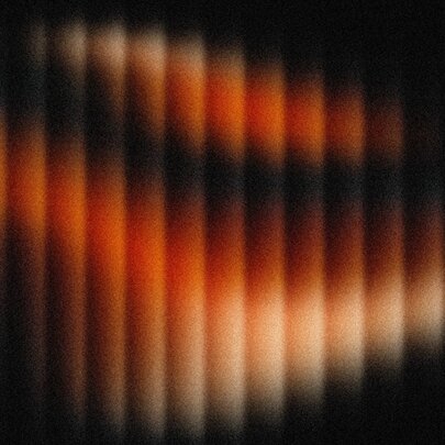 Illuminated panels  with shades of red on a black background. 