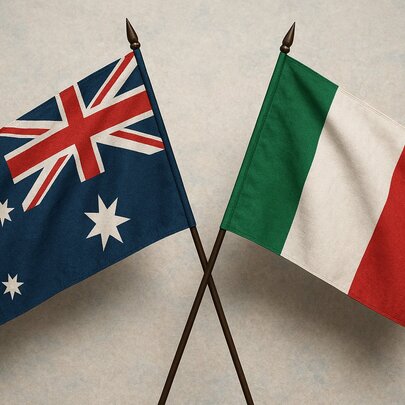 A small Italian and Australian flag side-by-side against a white background.