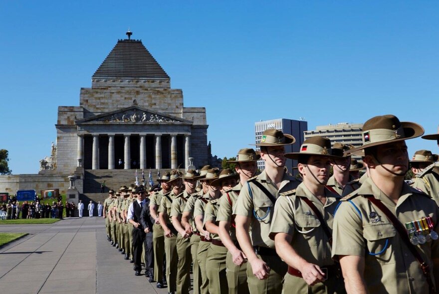 A troop of Australian soldiers in formation outside the Shrine of Remembrance.