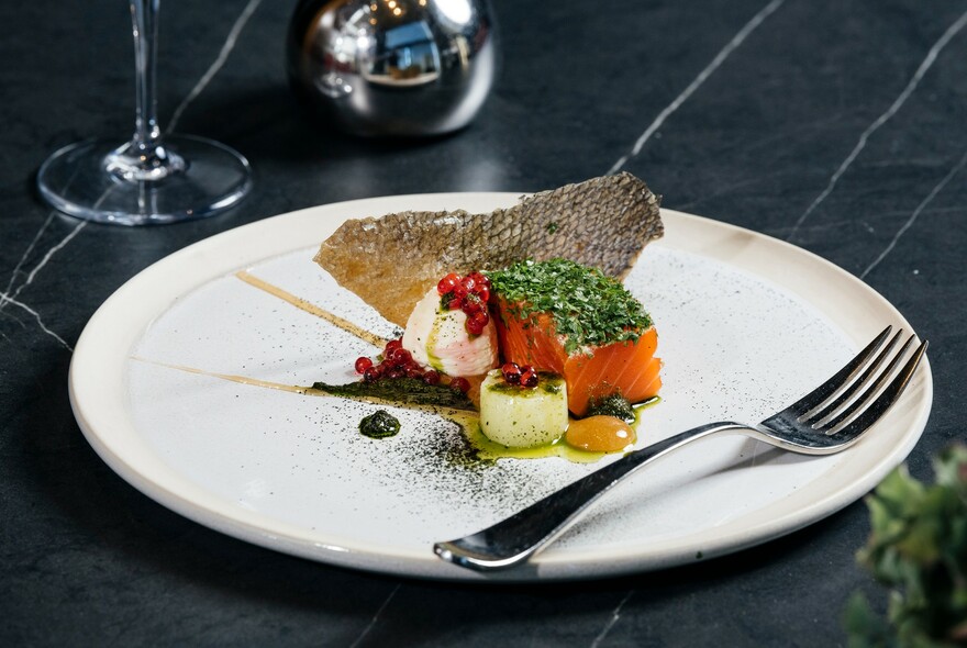 Salmon dish on a white plate.